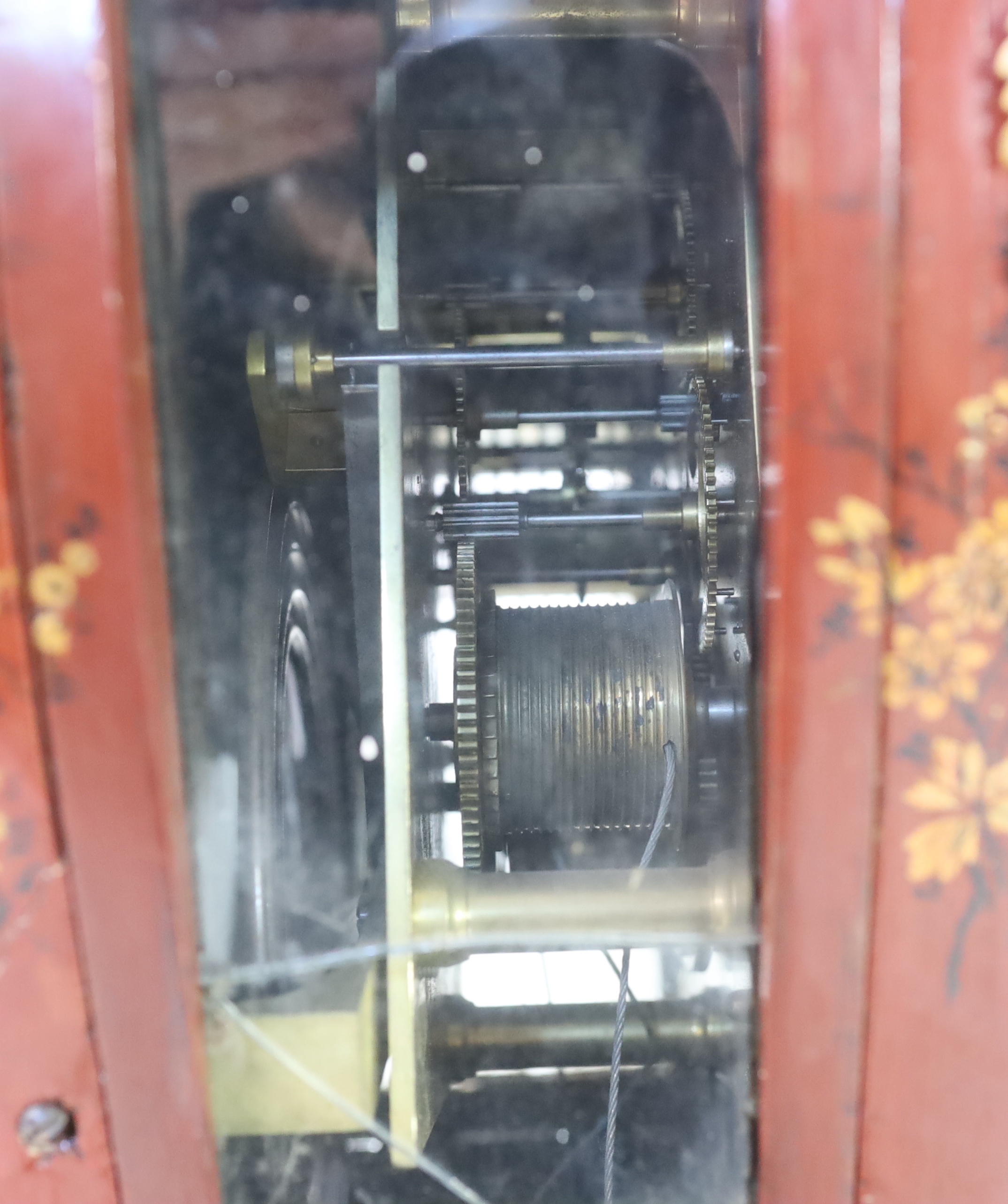 A Louis XV style ormolu mounted red chinoiserie lacquer longcase clock, 46cm wide, 33cm deep, 238cm high, Please note this lot attracts an additional import tax of 5% on the hammer price
